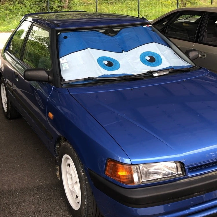 Pare-soleil avec yeux et couleurs personnalisables parmi +80 possibilités pour Mazda 323.